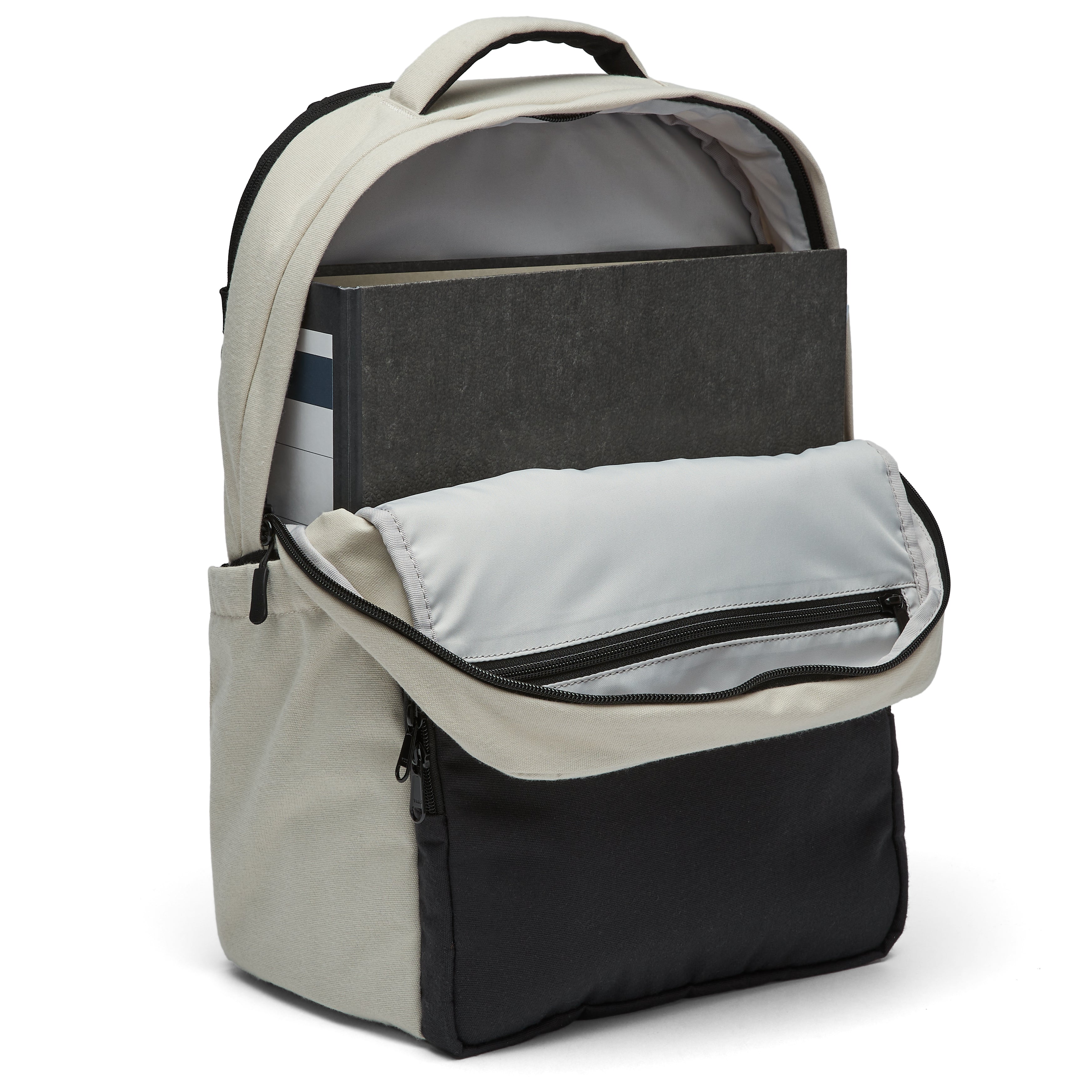 Ela Mo™ Work Rucksack | Dessert. Ein großer grauer Innenbereich des Schulrucksacks.
