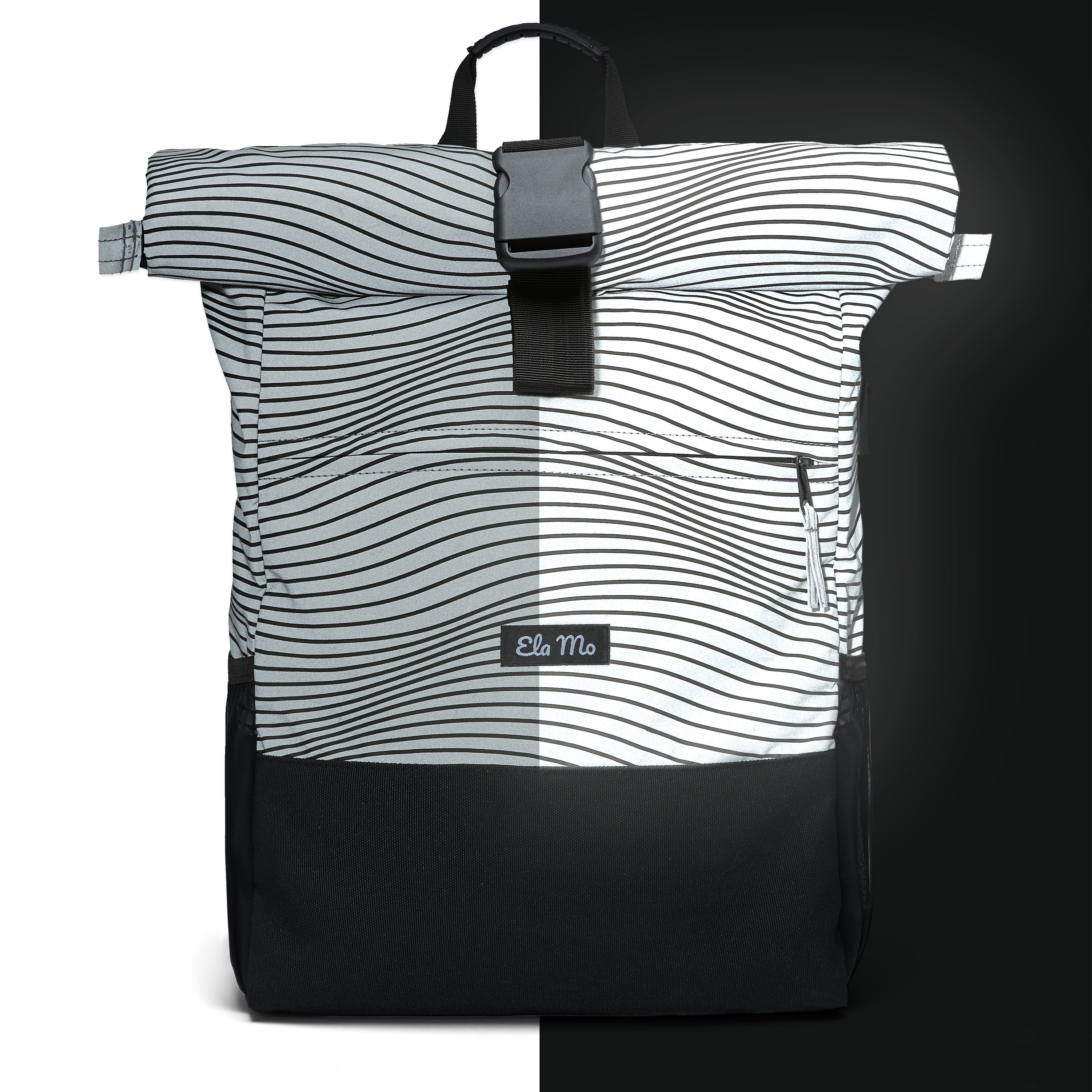 Ela Mo™ Rolltop Rucksack Night Edition | Wave. Ein reflektiver Rucksack mit Herstellerlogo.