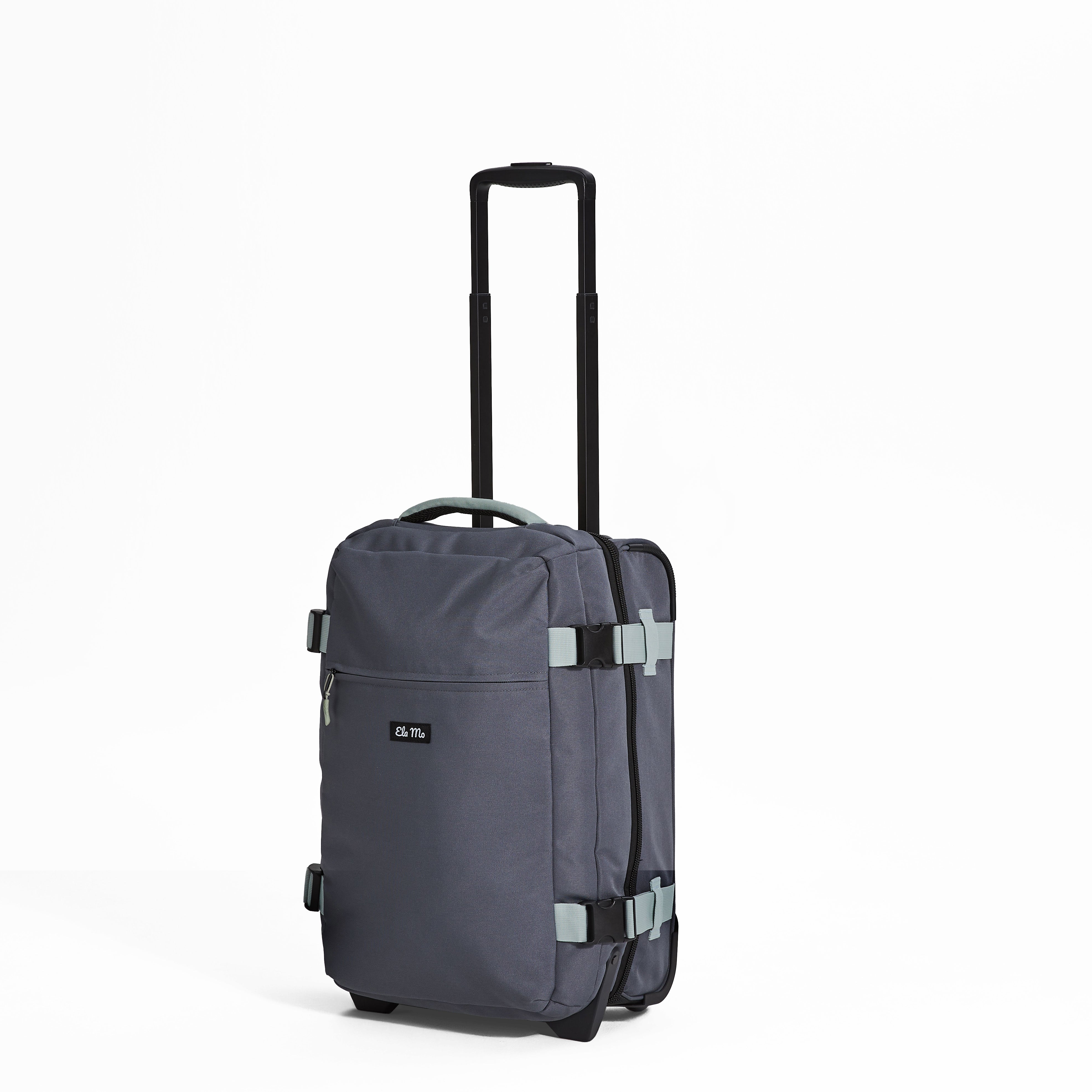 Ela Mo™ Reisetasche mit Rollen 42 Liter | Darkgrey Mint. Reisetasche mit Reißverschluss-Außenfach auf weißem Hintergrund.